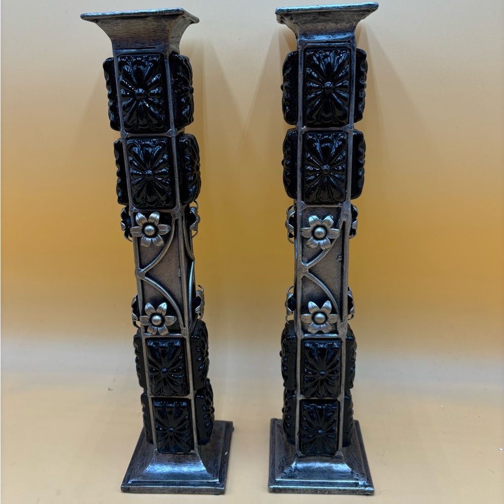 Black and silver ornate tall candlesticks
